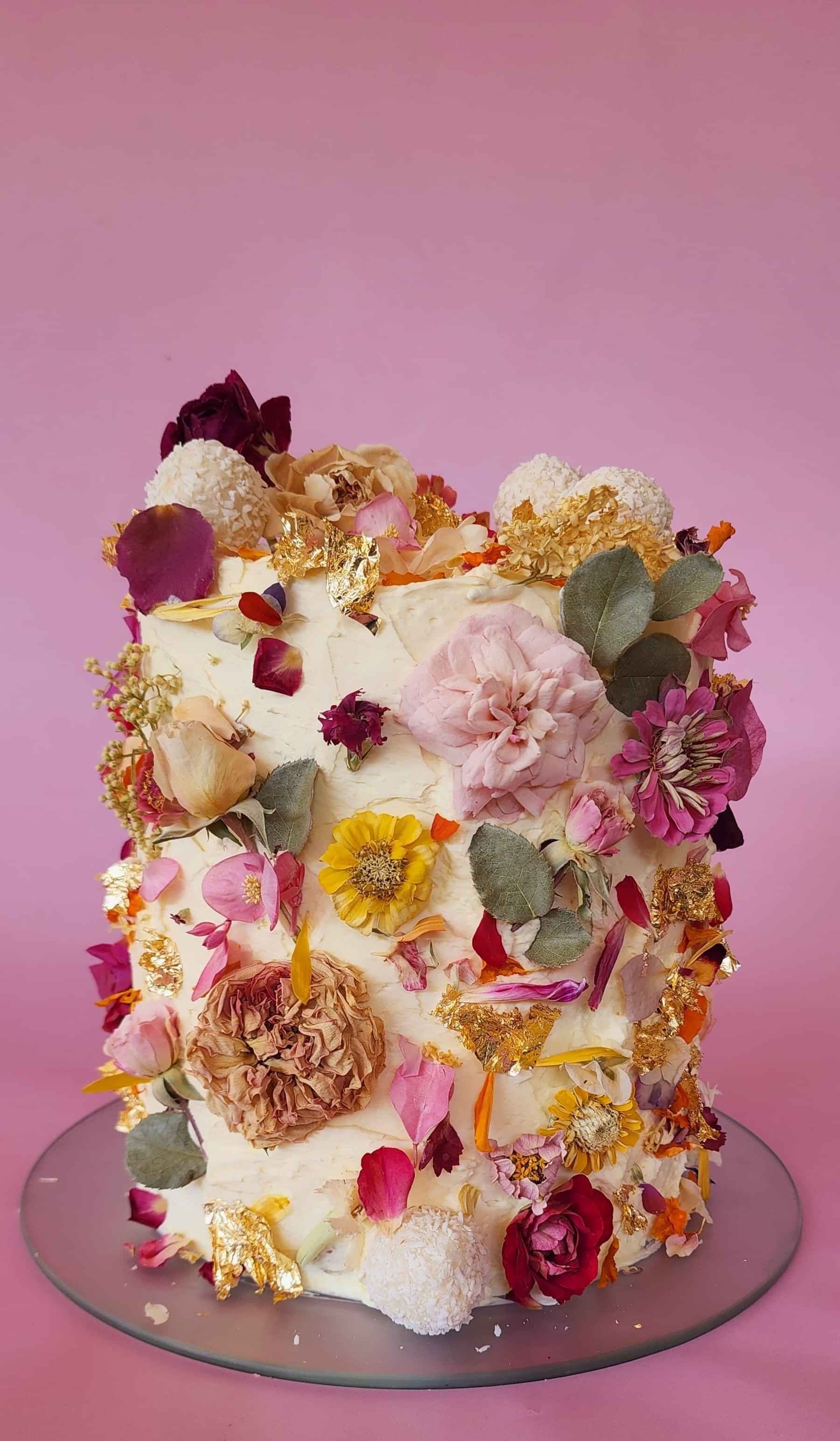 Special occasion cake in vanilla with edible flowers
