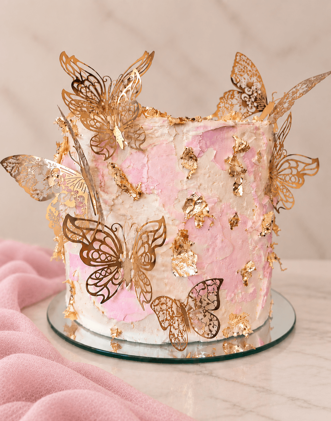 Luxury Signature Cake for birthdays, milestones, or special occasions, styled with gold butterflies