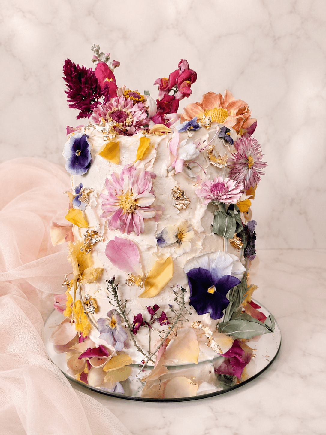 Floral cake with dried edible flowers and petals