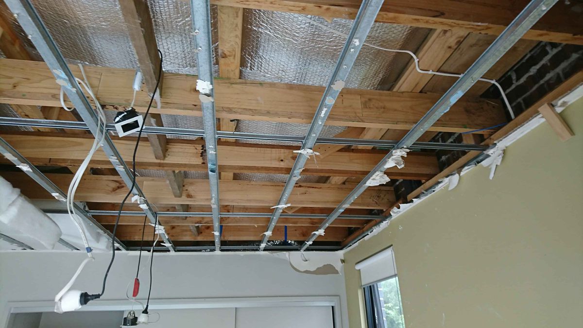 Collapsed ceiling caused by a non-compliant rain head