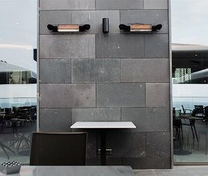 Wall mounted Veito Blade directing heat to table below. 