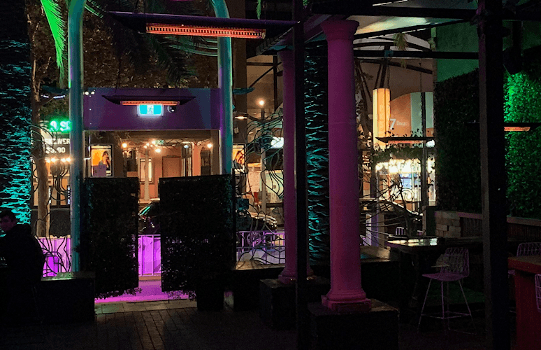 Customers enjoying the warmth under Architectural Series heater