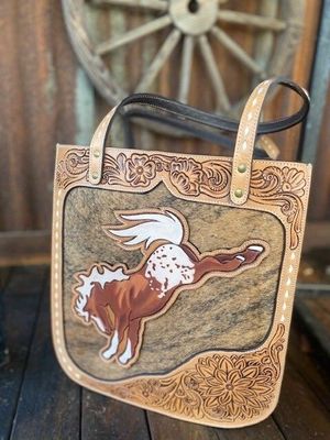 Bucking horse with brown cowhide inlay