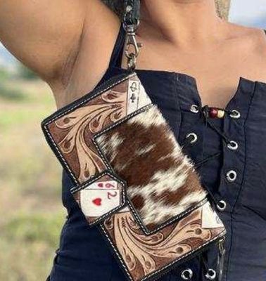 Tooled card design purse with cowhide