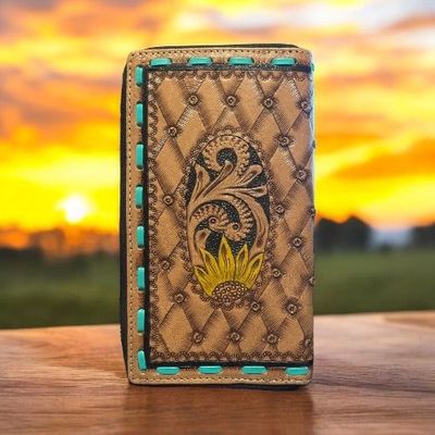 Ladies tooled sunflower wallet with turquoise buck stitching.