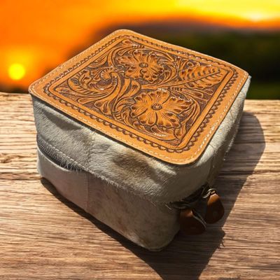 Cowhide jewellery box with tooled leather top