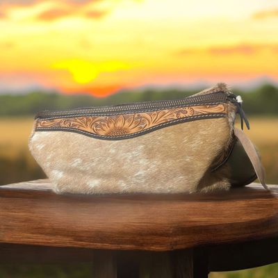 Cowhide toiletry bag with tooled sunflower