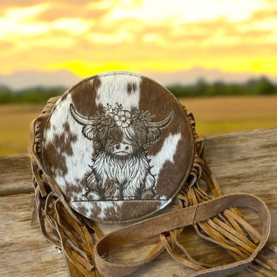 Cowhide bag with highlander