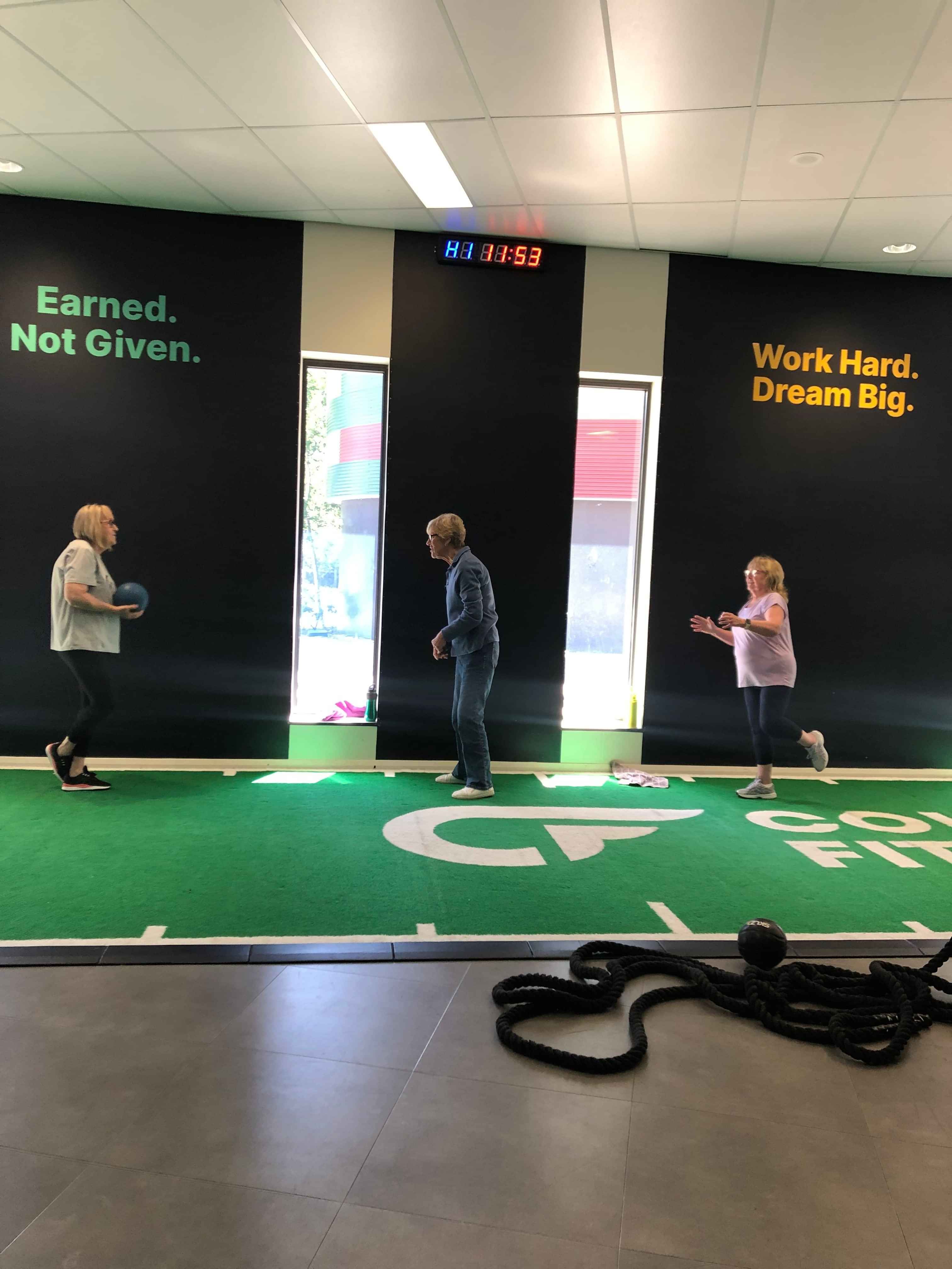 Participants in a diabetes class performing ball exercises for strength and mobility