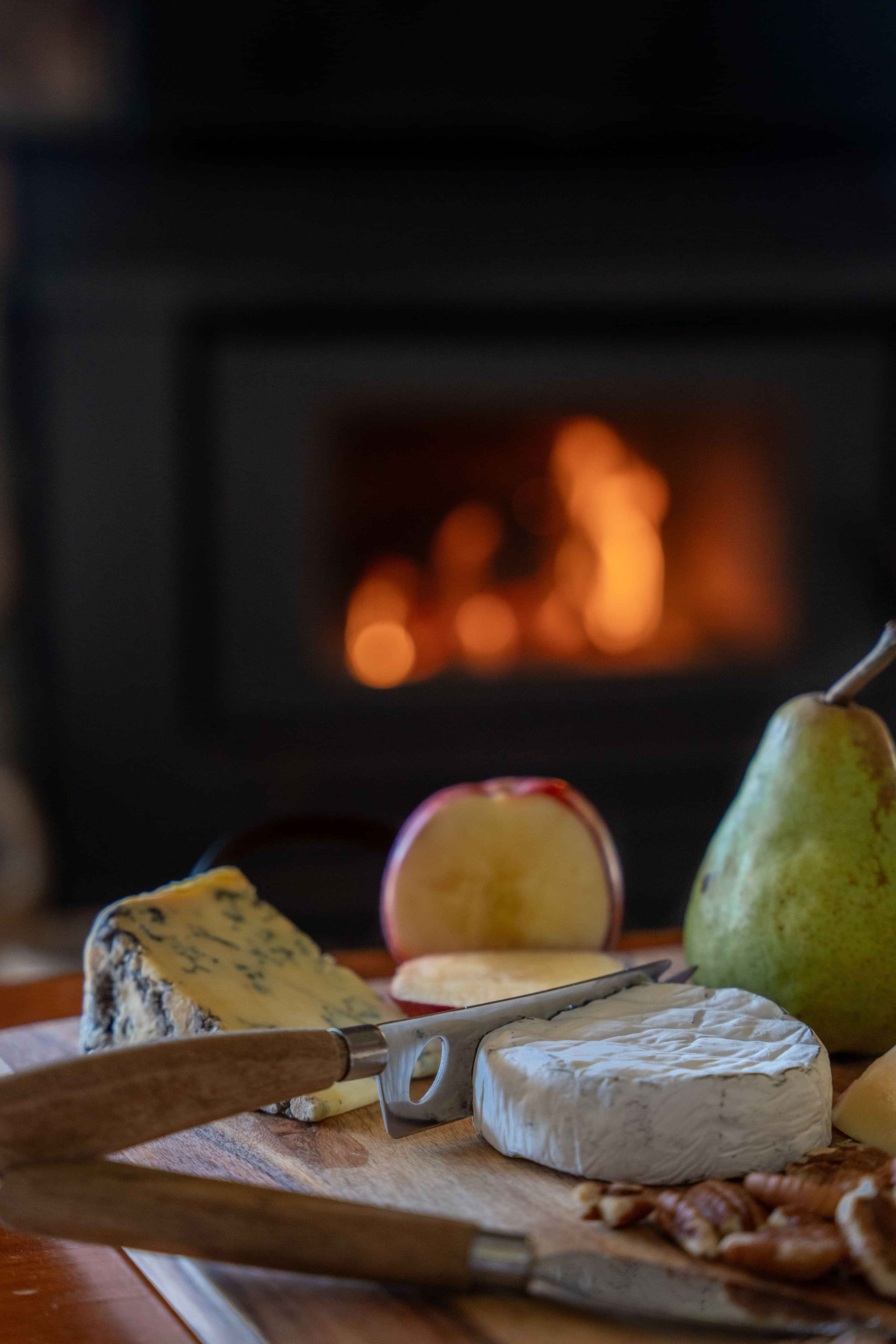 cheese board with background fire