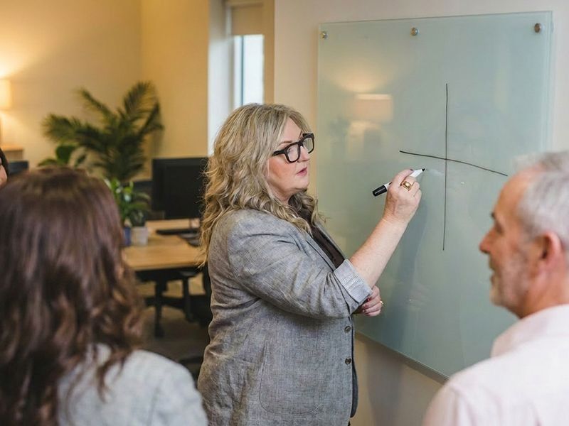Roxanne Grey facilitating workshop with clients