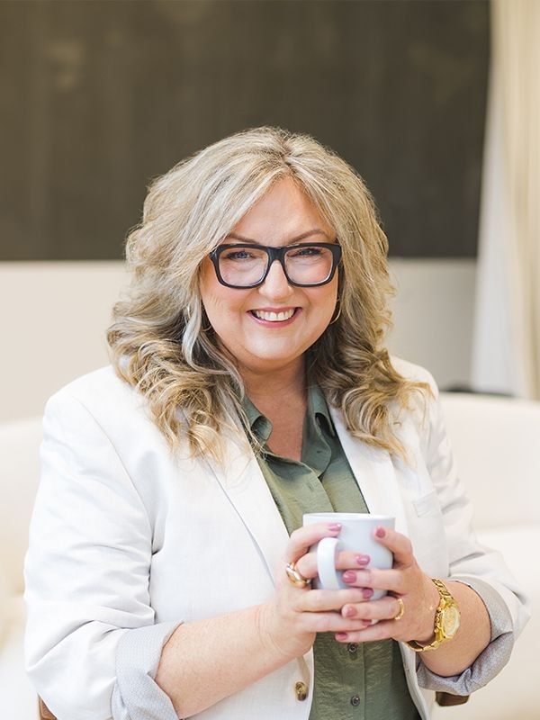 Roxanne Grey talking with clients
