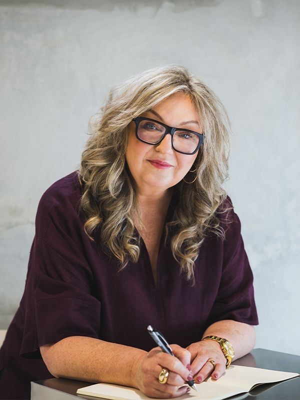 Roxanne Grey consulting with clients
