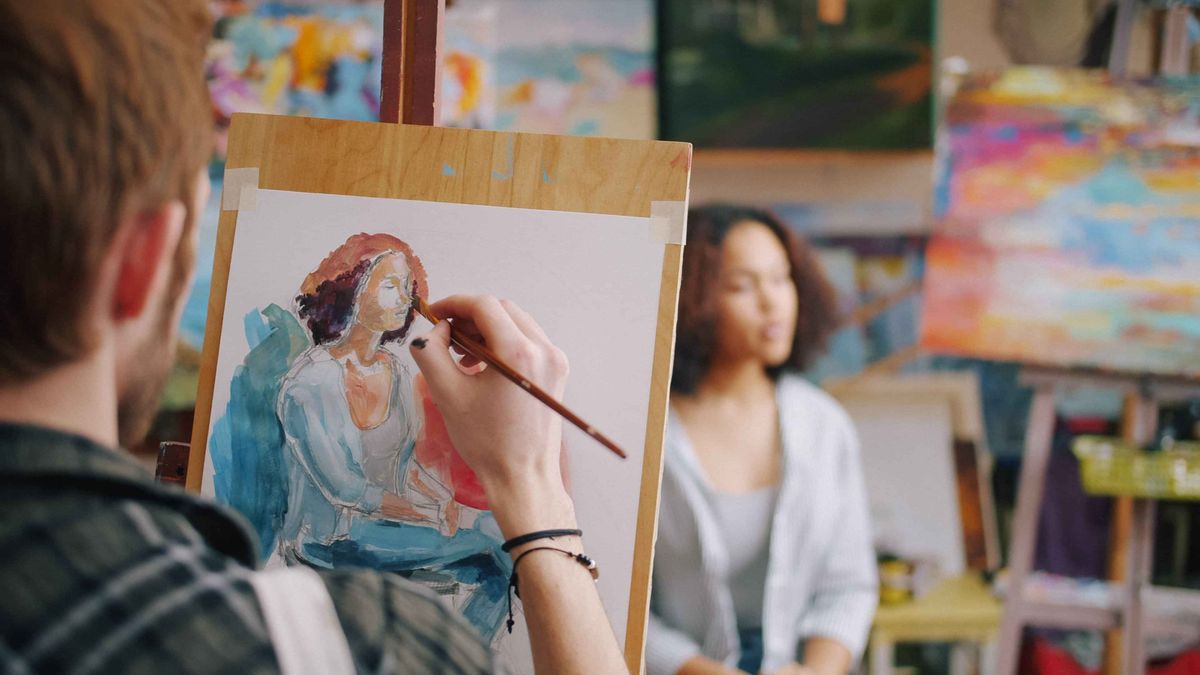 Adults painting together