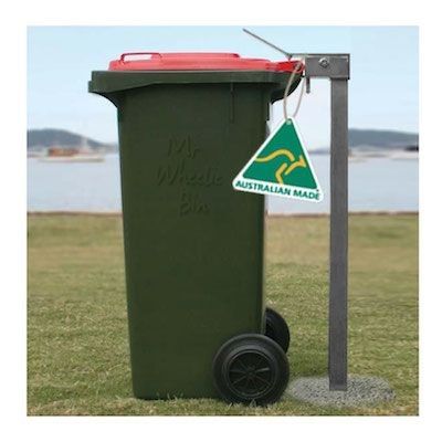 The secure bin stands image, showing a single galvanised bin stand securing a 240L bin, concreted into the ground, in an outdoor park setting